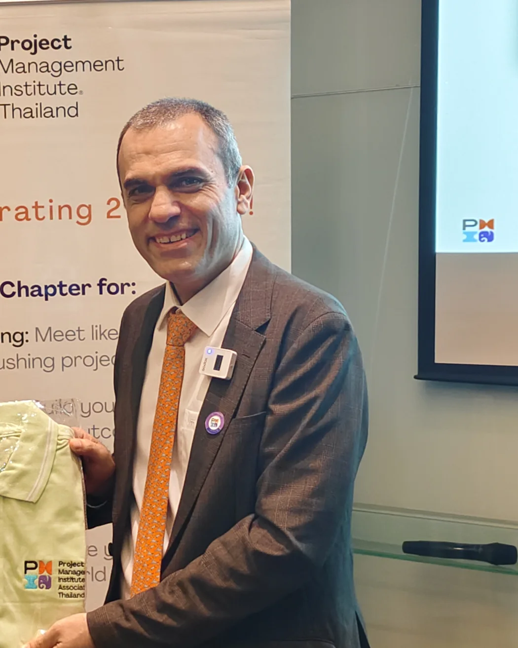 Dr. Petros Rigas at a PMI Thailand recognition moment